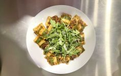 Ricotta ravioli in bolognese sauce